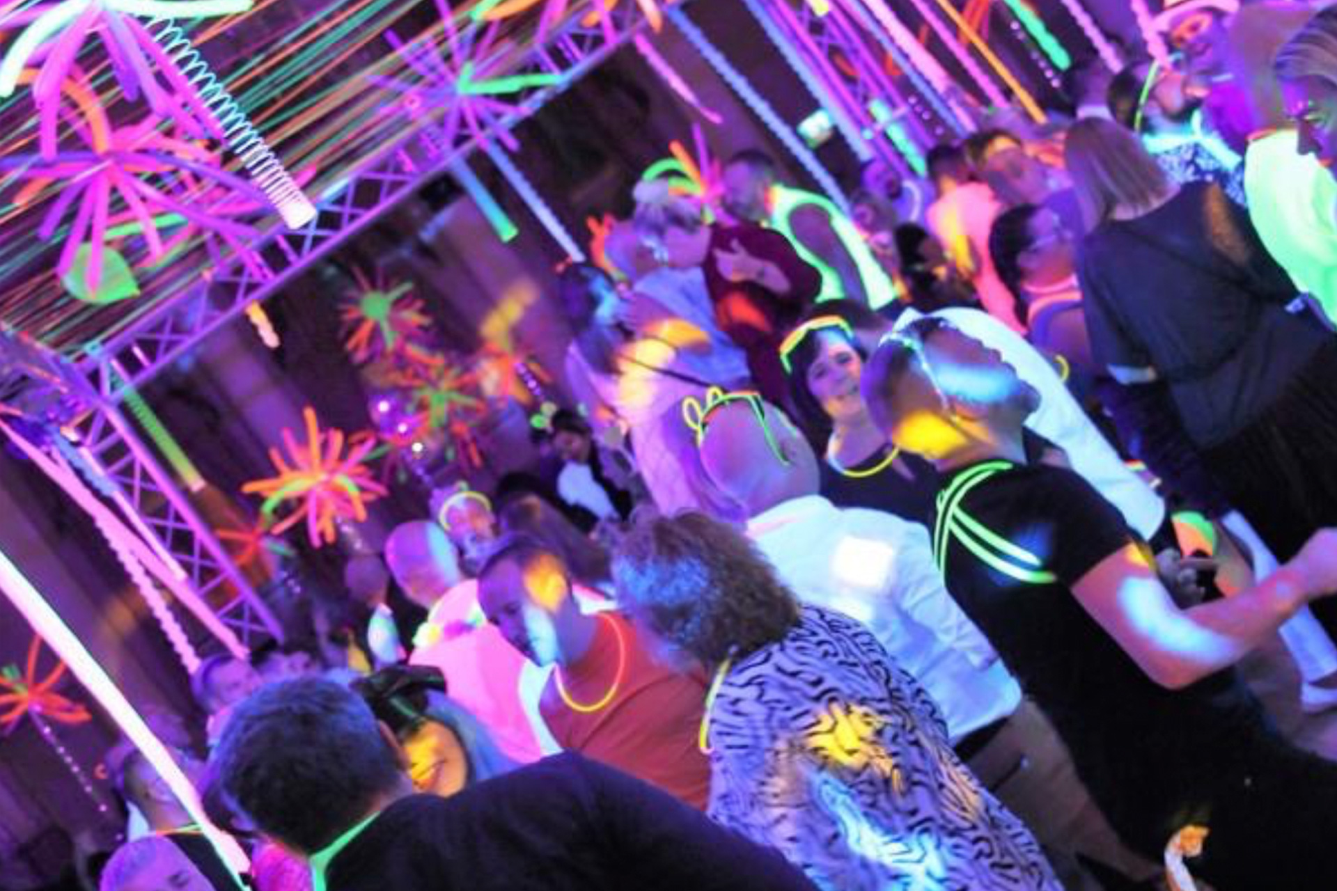 Guests dancing at a disco.